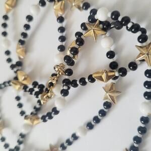 Monet Long Single Strand Star Beaded Necklace Black and Gold Tone